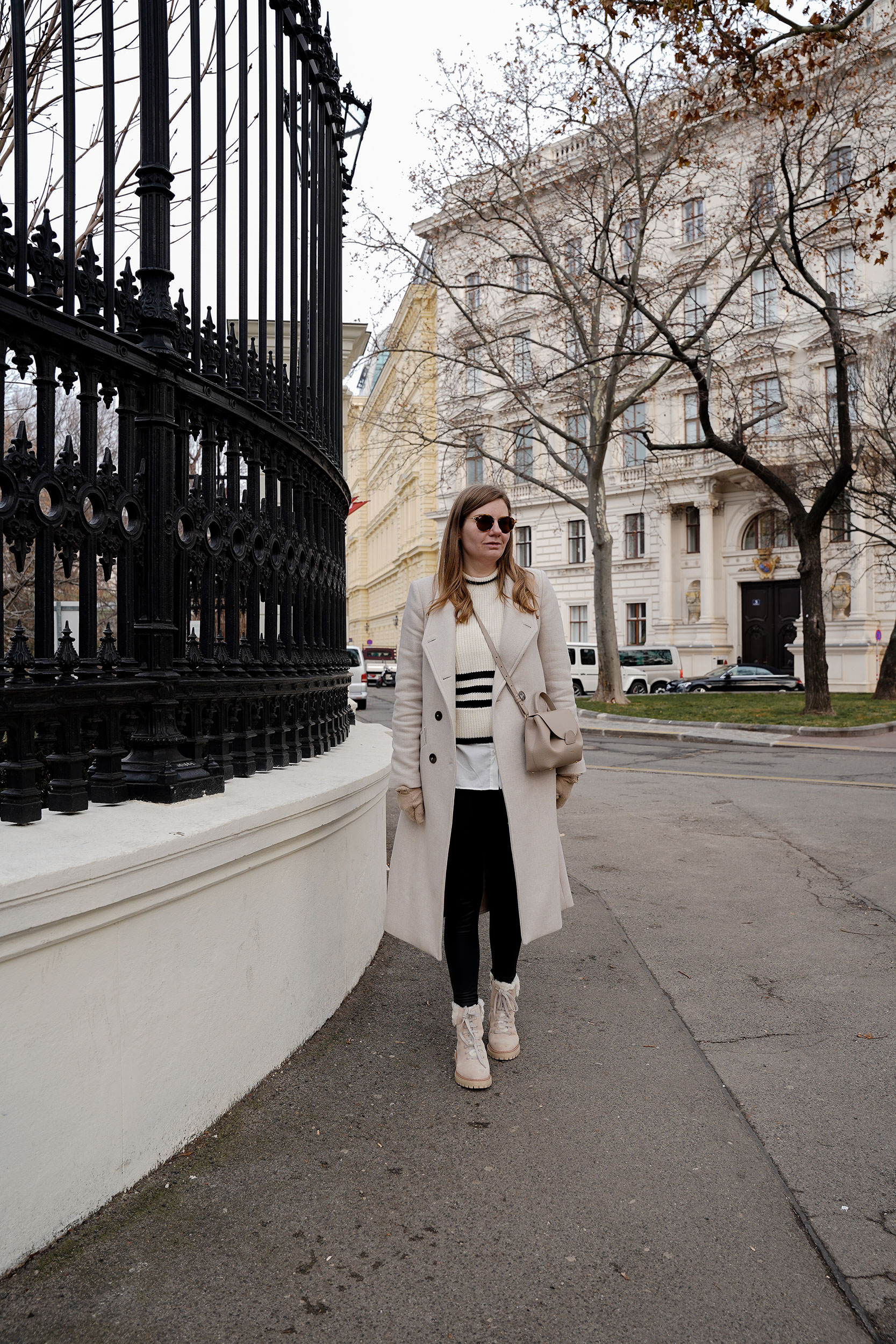 Winter Outfit Vienna Streetstyle, Sweater, winter coat, striped sweater, boots, polene bag