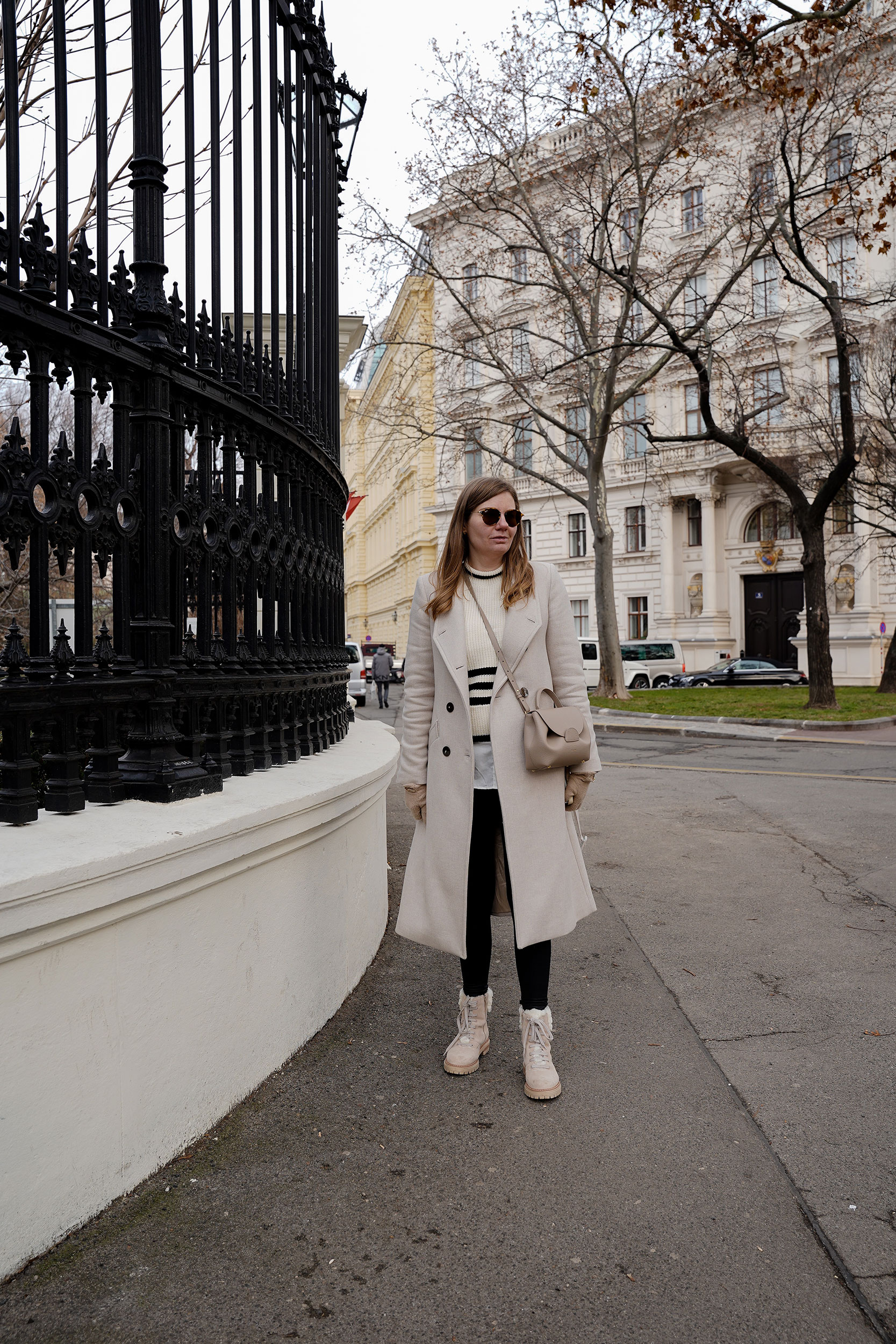 Winter Outfit Vienna Streetstyle, Sweater, winter coat, striped sweater, boots, polene bag