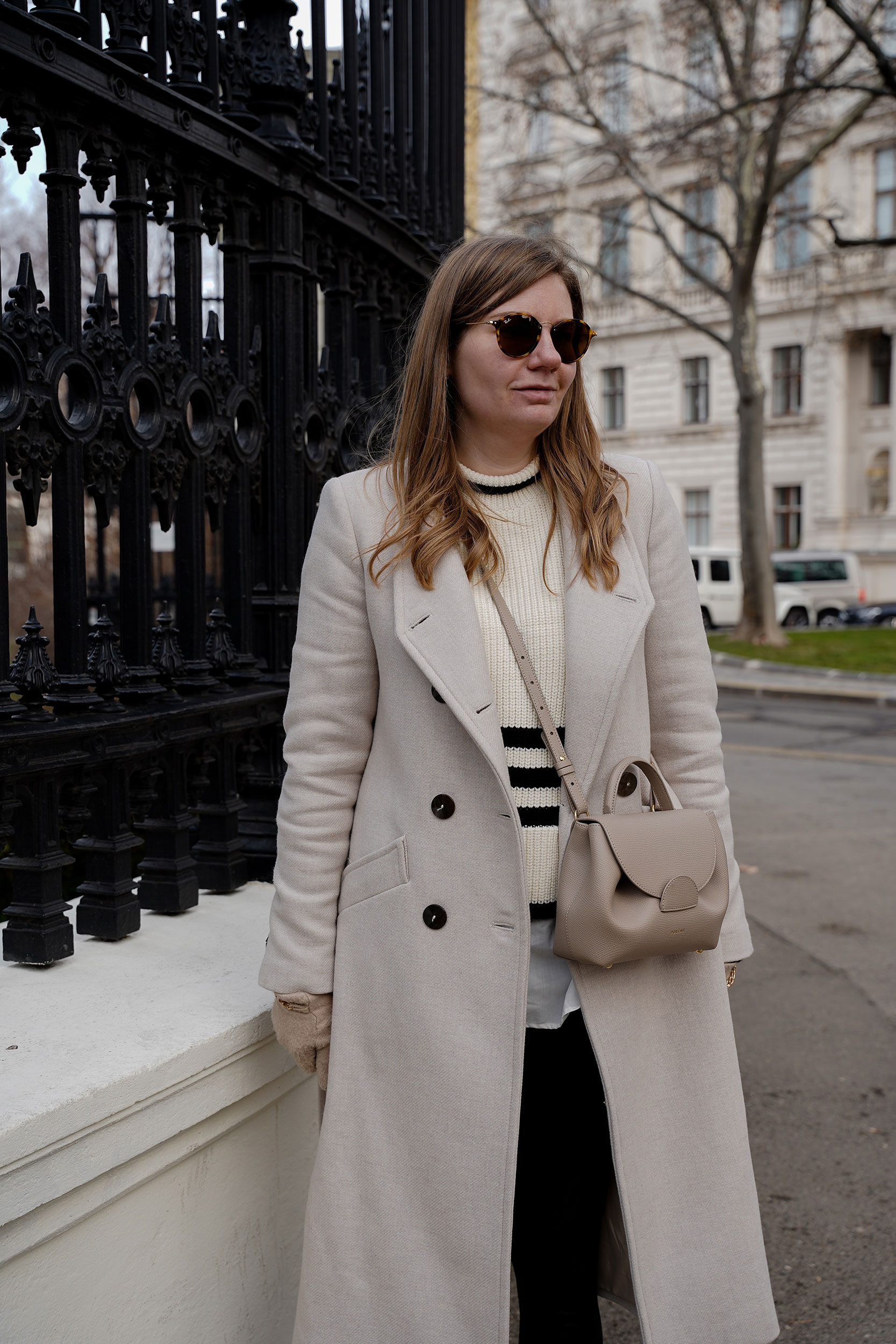 Winter Outfit Vienna Streetstyle, Sweater, winter coat, striped sweater, boots, polene bag