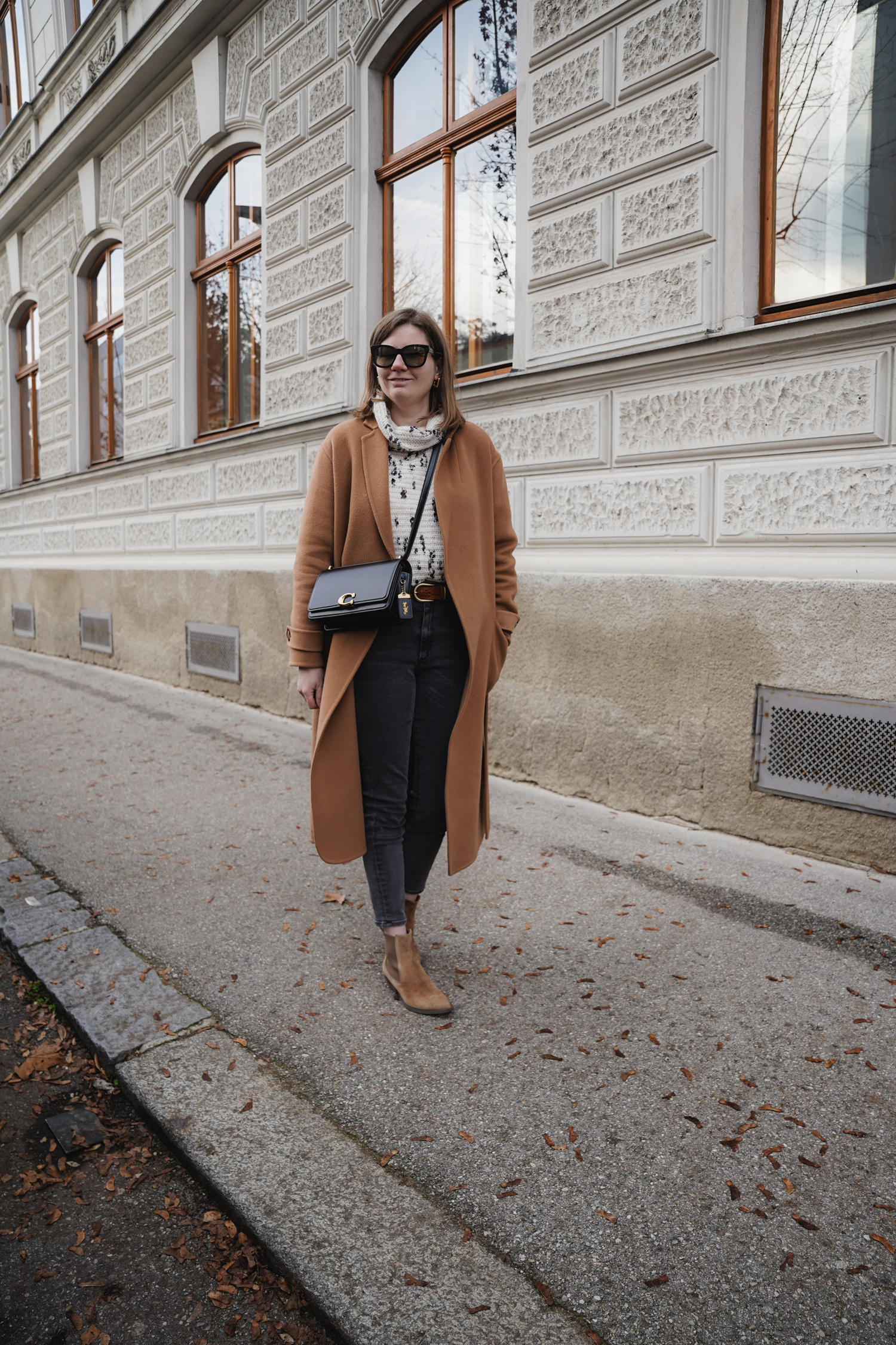 Sezane winter coat, sweater, jeans coach bag