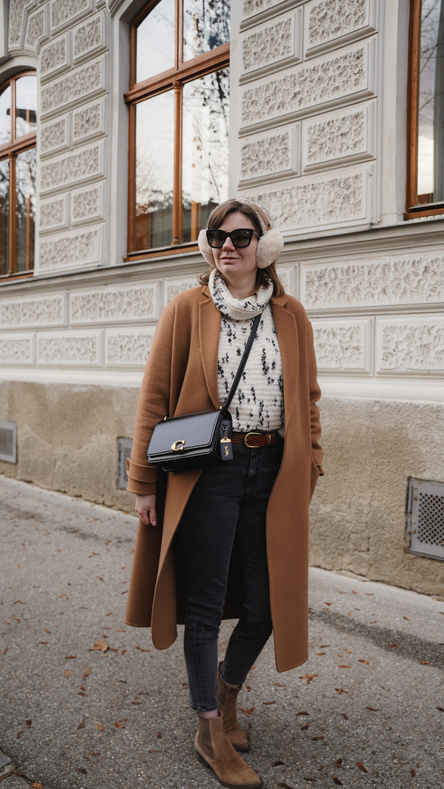 Sezane winter coat, sweater, jeans coach bag