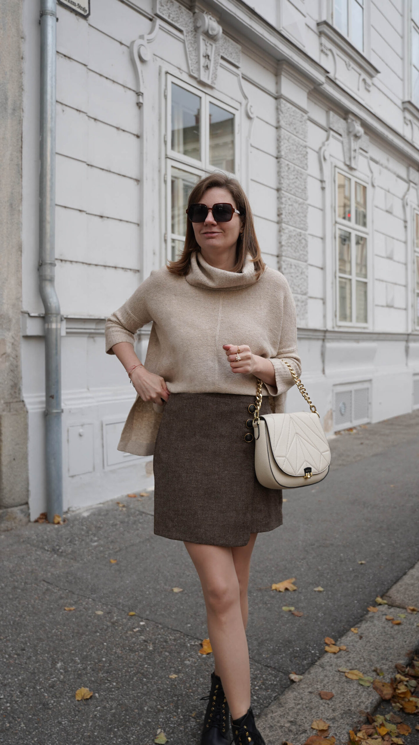 Sezane skirt, beige sweater, Zoe Lu best buddy Creme bag