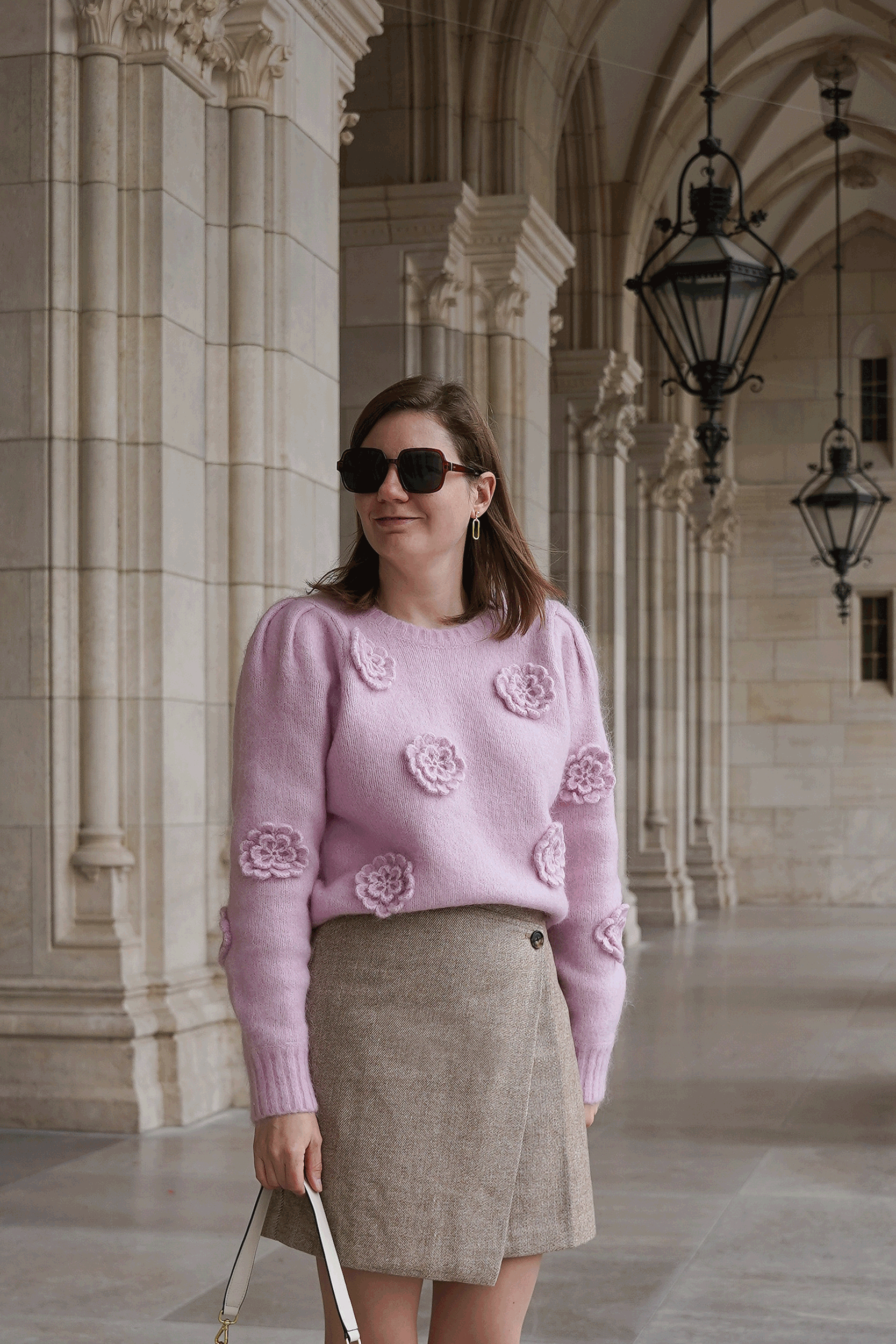 pink sweater, beige mini skirt