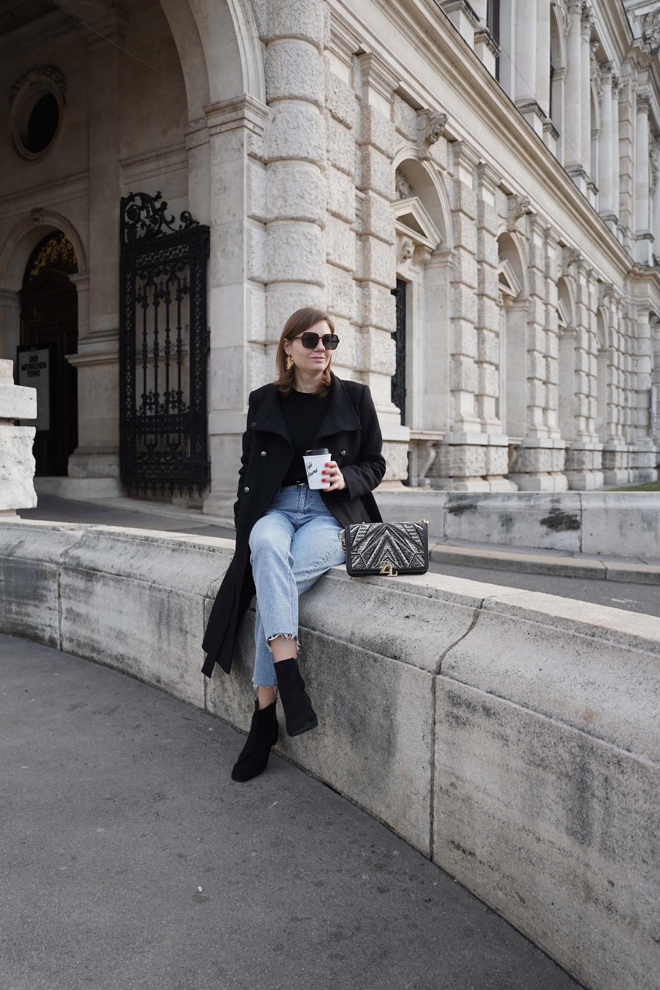 Black coat, blue jeans, straight leg jeans, Vienna, black boots, winter outfit 