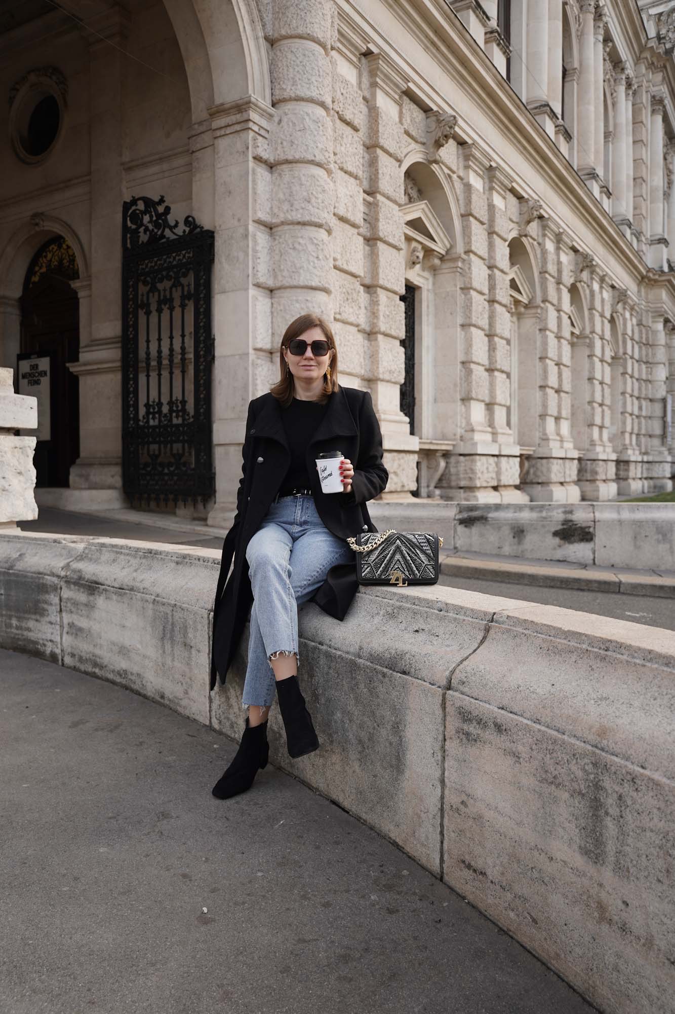 Black coat, blue jeans, straight leg jeans, Vienna, black boots, winter outfit 