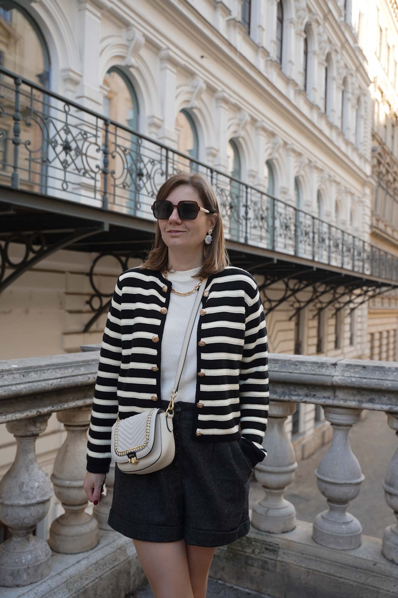 Striped cardigan outfit shorts sezane Bobbie’s knee high boots Vienna streetstyle