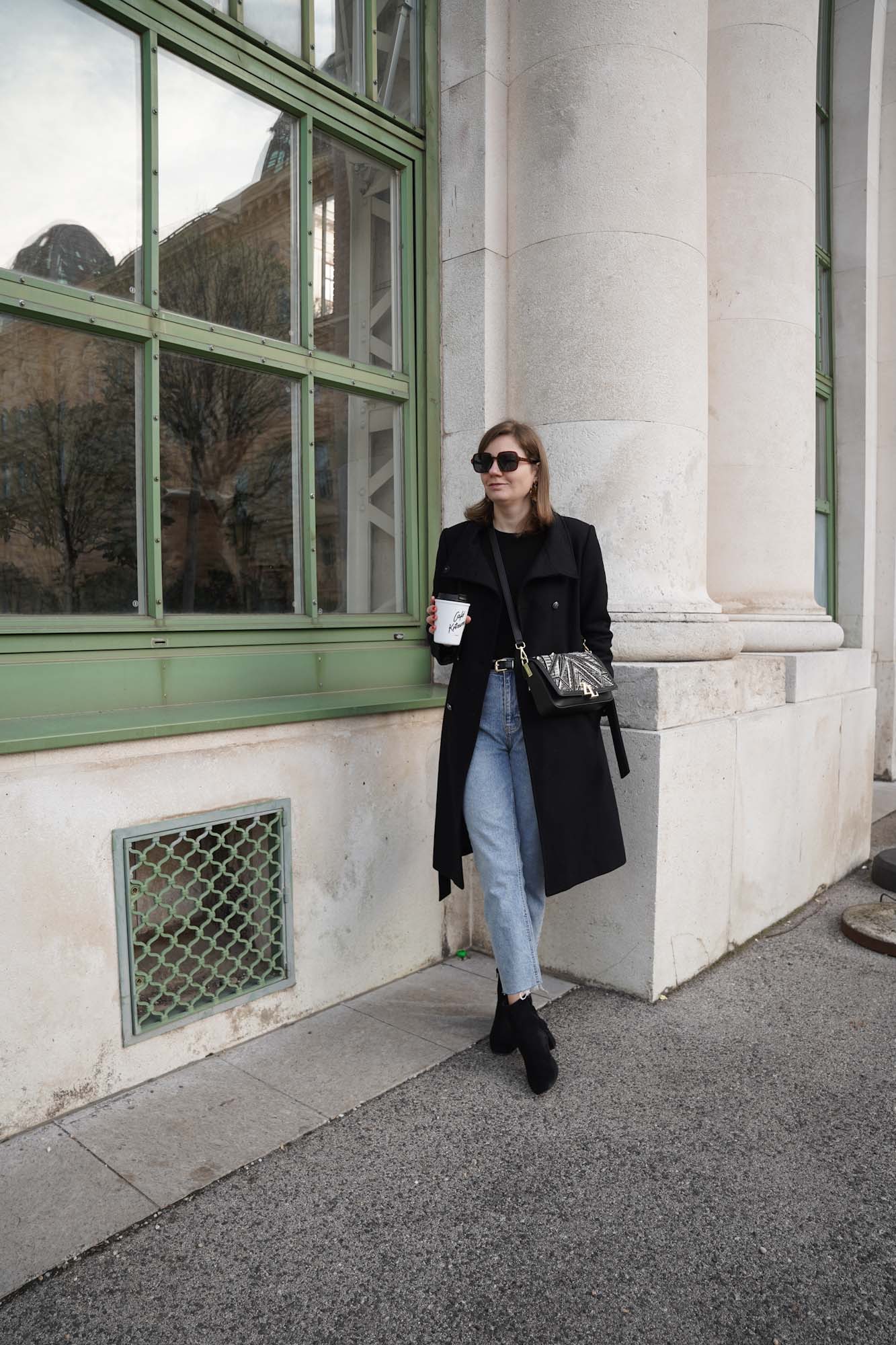 Black coat, blue jeans, straight leg jeans, Vienna, black boots, winter outfit 