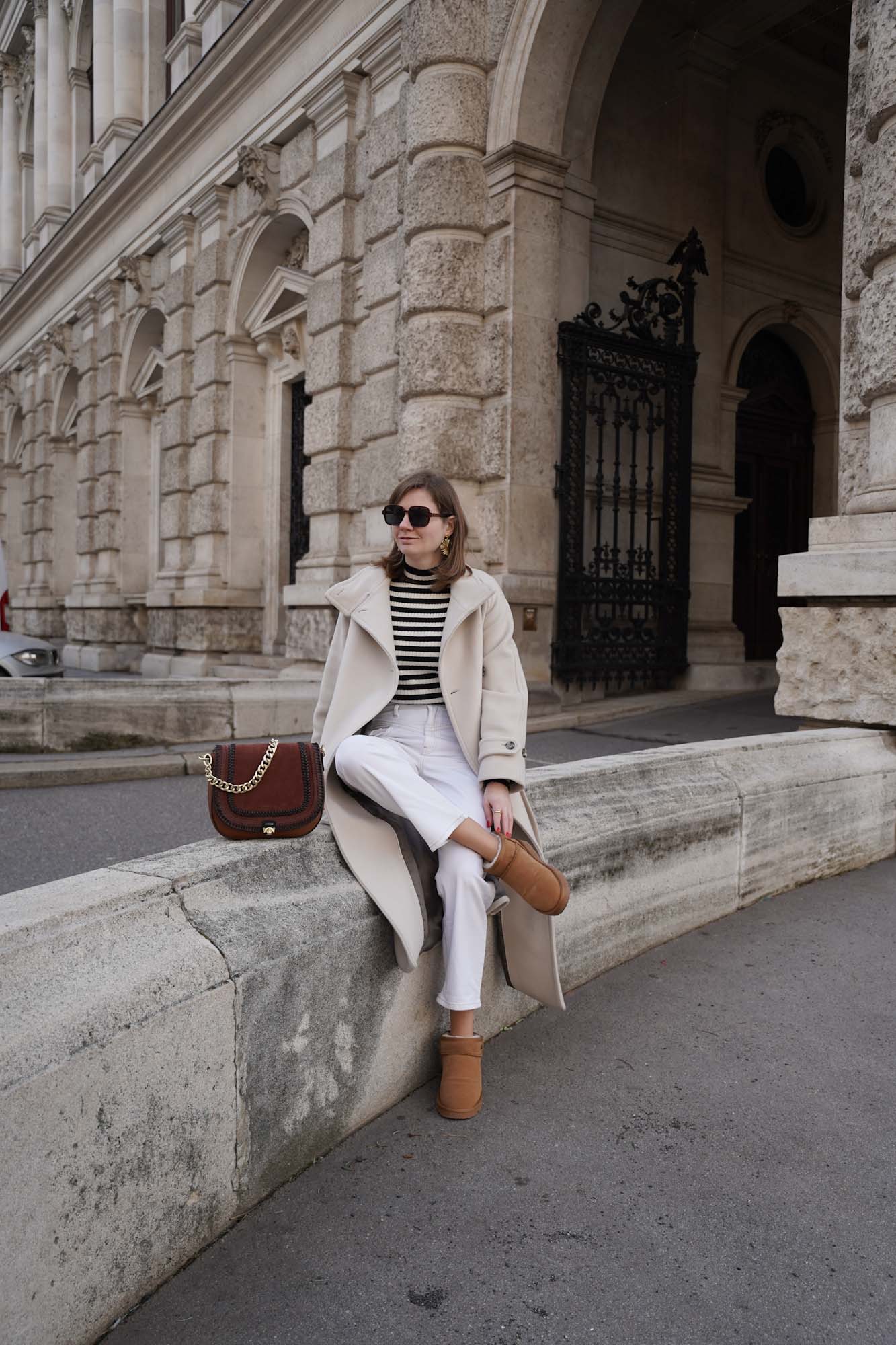 Winter outfit Vienna mango coat Ugg boots striped sweater white jeans